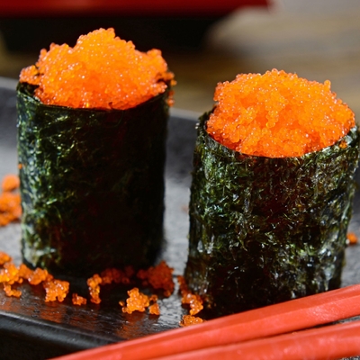 Des Kapelan-Fisch-Rogensushifliegenden fisches Masago Tobiko Rogen gefrorener Kapelan